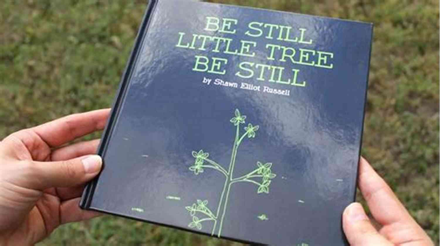 Author Jane Smith Holding A Copy Of Be Still Little Tree Be Still Be Still Little Tree Be Still