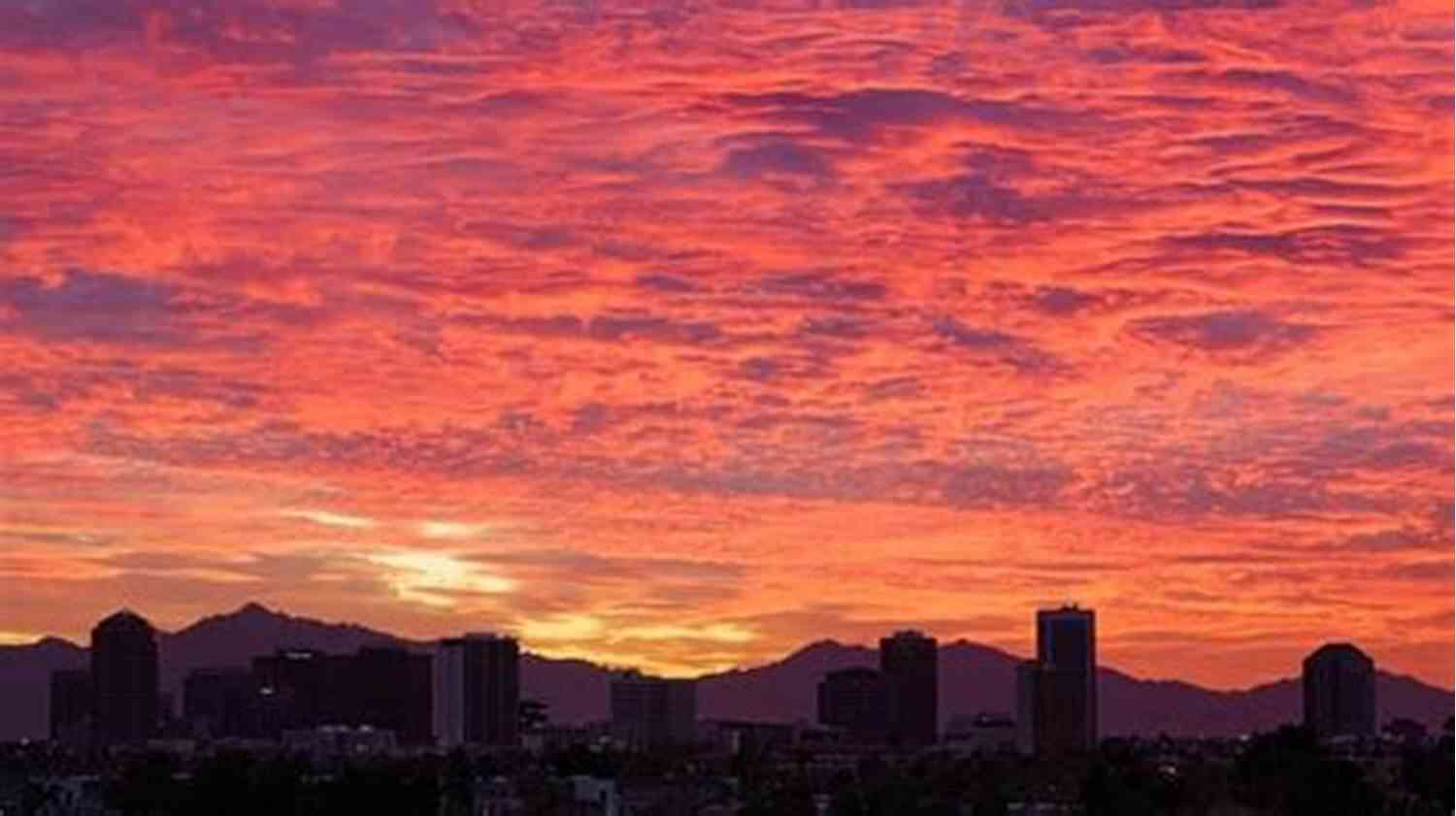 The Fiery Phoenix Skyline At Sunset, An Emblem Of The Astonishing Heat That Engulfs The City Hot Enough To Burn (Phoenix Fury 1)