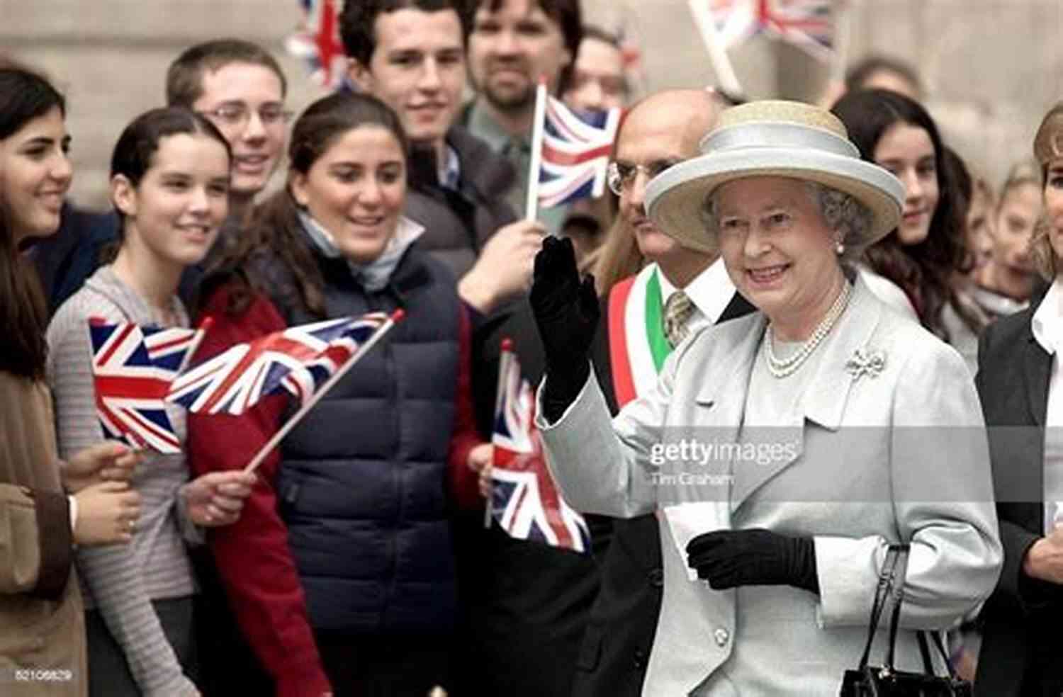 The Queen Waving To The Crowd During A Public Event The Queen: 90 Majestic Years (Kindle Single)