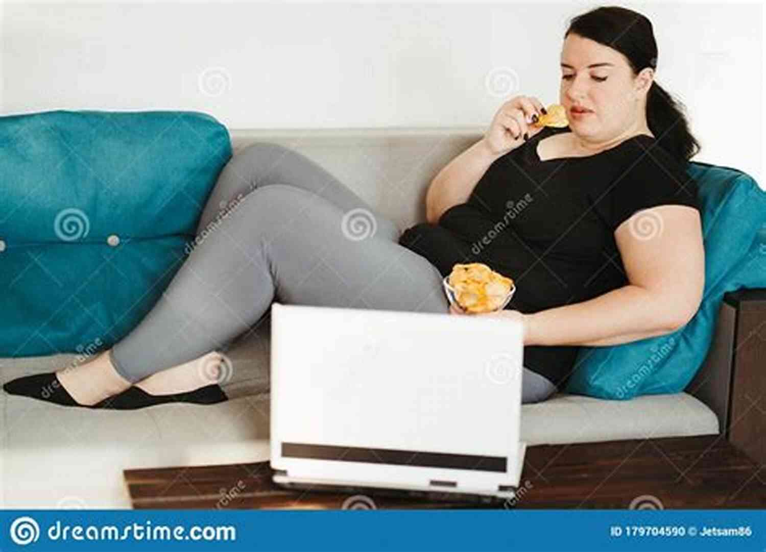 Woman Sitting On A Couch Surrounded By Junk Food Beat The Binge Control Your Impulsive Overeating : Help I M Out Of Control: The Connection Between Emotions And Impulsive Overeating